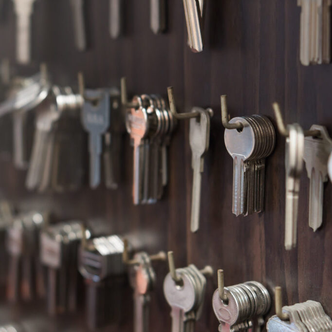 Several Keys type such as household and car key use for copying or duplicating hang on the wall in the locksmith workshop